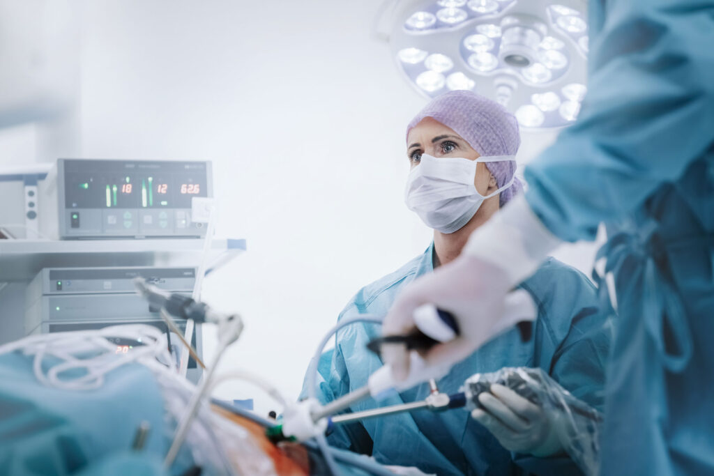 a doctor wearing a mask and surgical gown