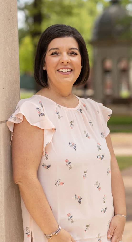 a woman smiling at camera