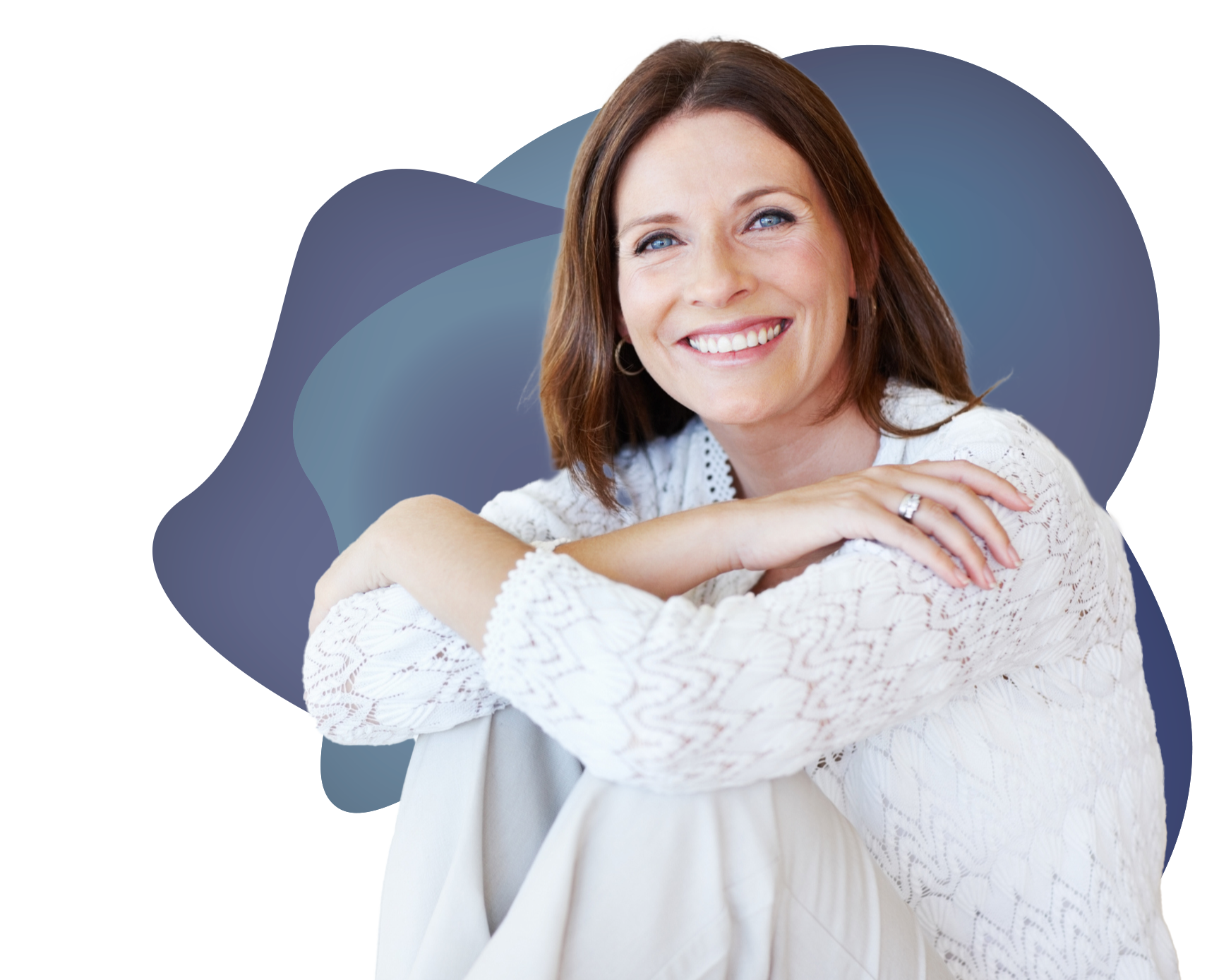 a woman smiling with her arms crossed